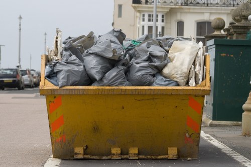 South London waste collection truck in action